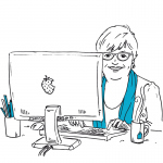 Biggi sitzt am Schreibtisch vor dem Pc und textet